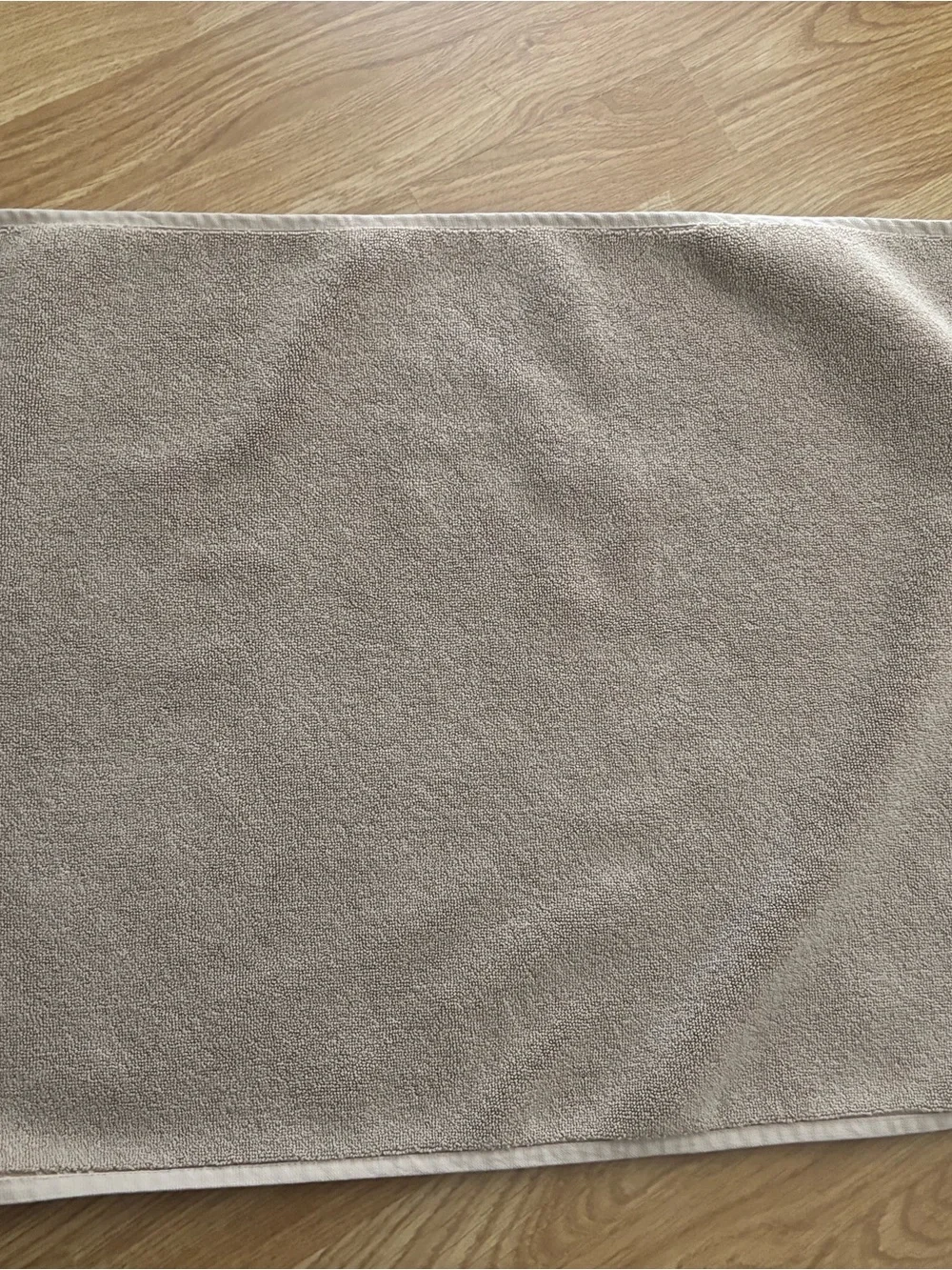 Neutral beige bath rug